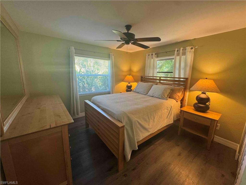 203 Esther Street Naples, FL 34104 - Photo 24 of 33 Bedroom featuring dark wood-style floors and ceiling fan