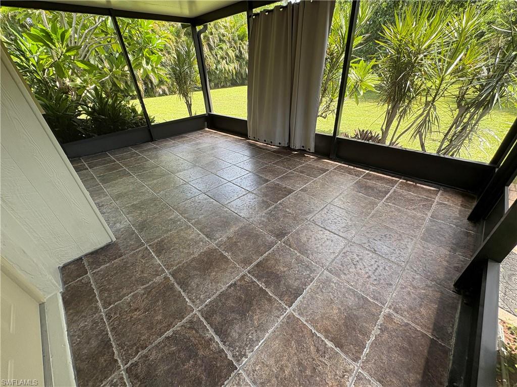 203 Esther Street Naples, FL 34104 - Photo 30 of 33 View of unfurnished sunroom