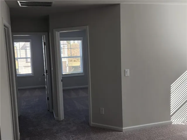 a view of an empty room with window