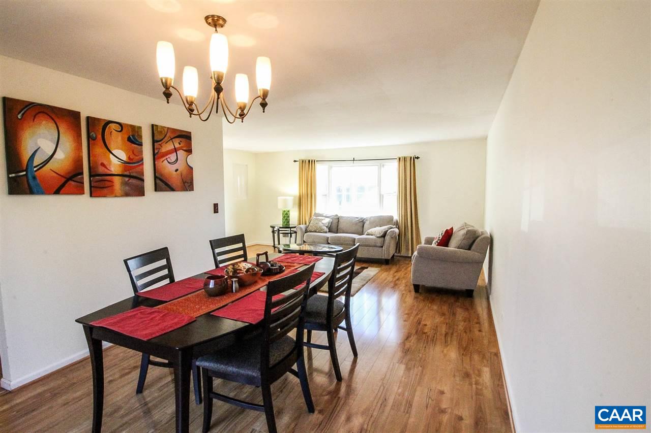 726 Shamrock Road Charlottesville, VA 22903 - Photo 9 of 27 a view of a dining room with furniture and wooden floor