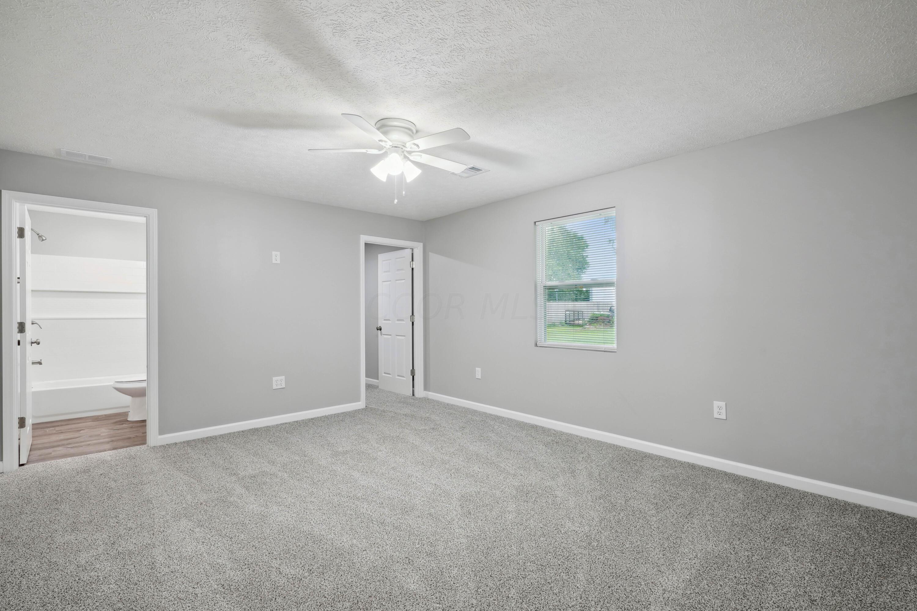 6705 Johnson Road Galloway, OH 43119 - Photo 15 of 30 Primary Bedroom with on-suite bath and huge walk-in closet!