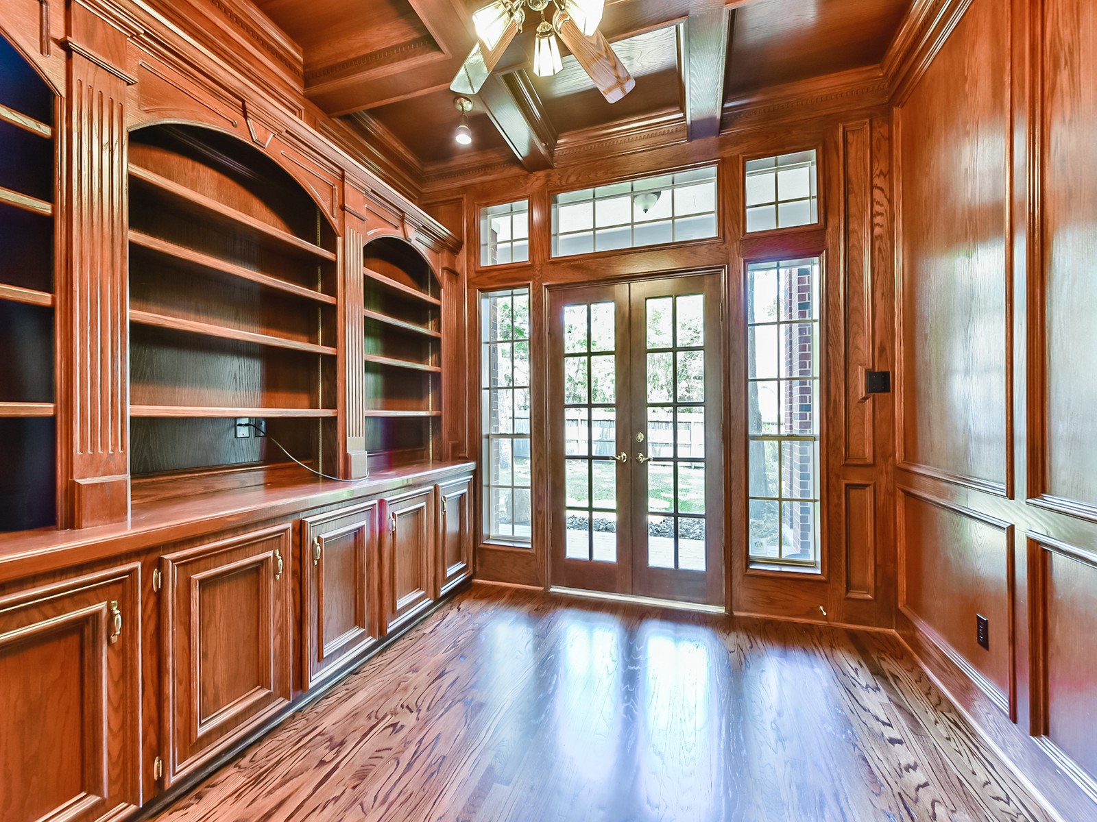 166 East Capstone Circle Spring, TX 77381 - Photo 22 of 45 a view of an empty room with wooden floor and a window