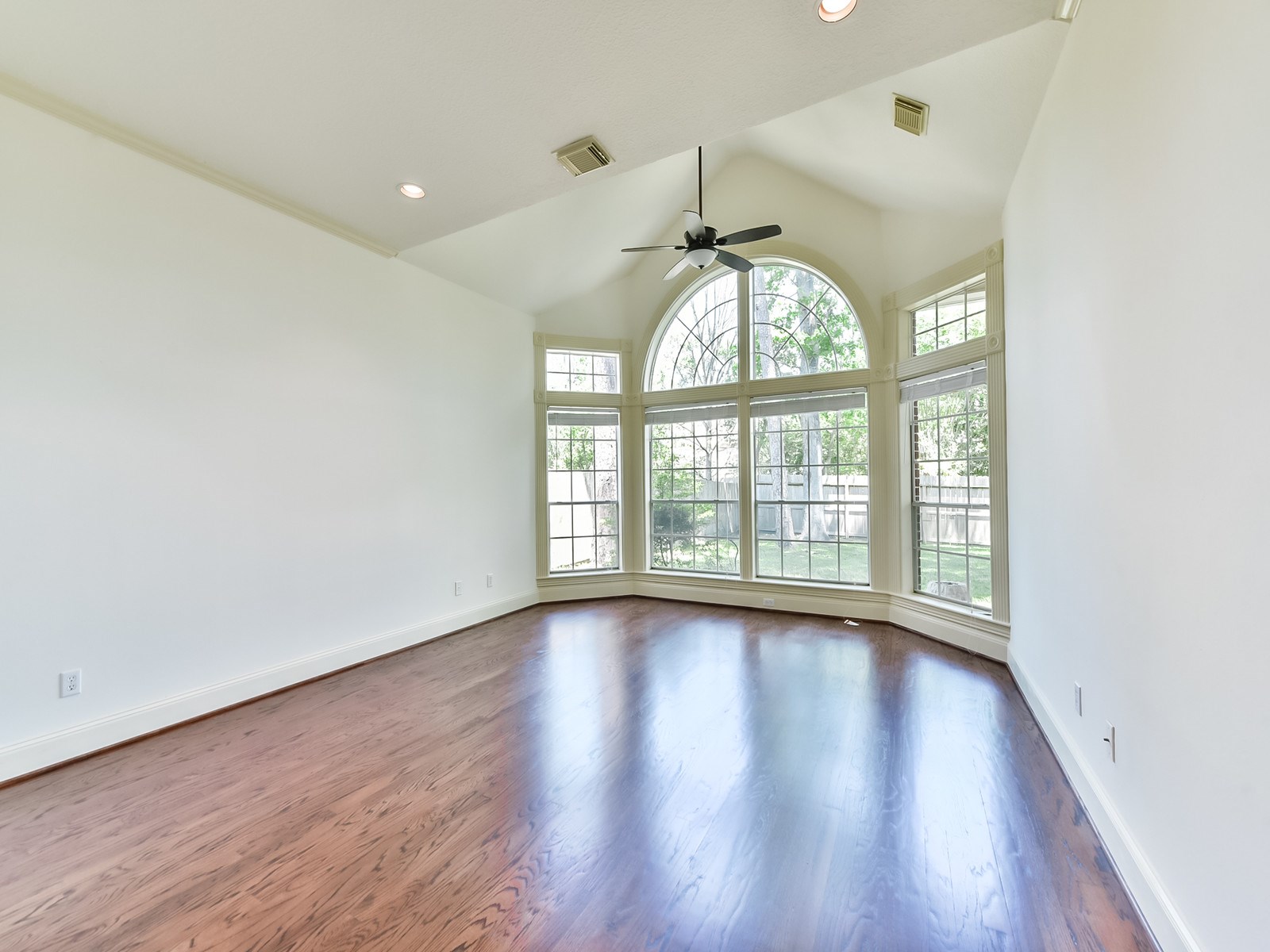 166 East Capstone Circle Spring, TX 77381 - Photo 24 of 45 wooden floor in an empty room with a window