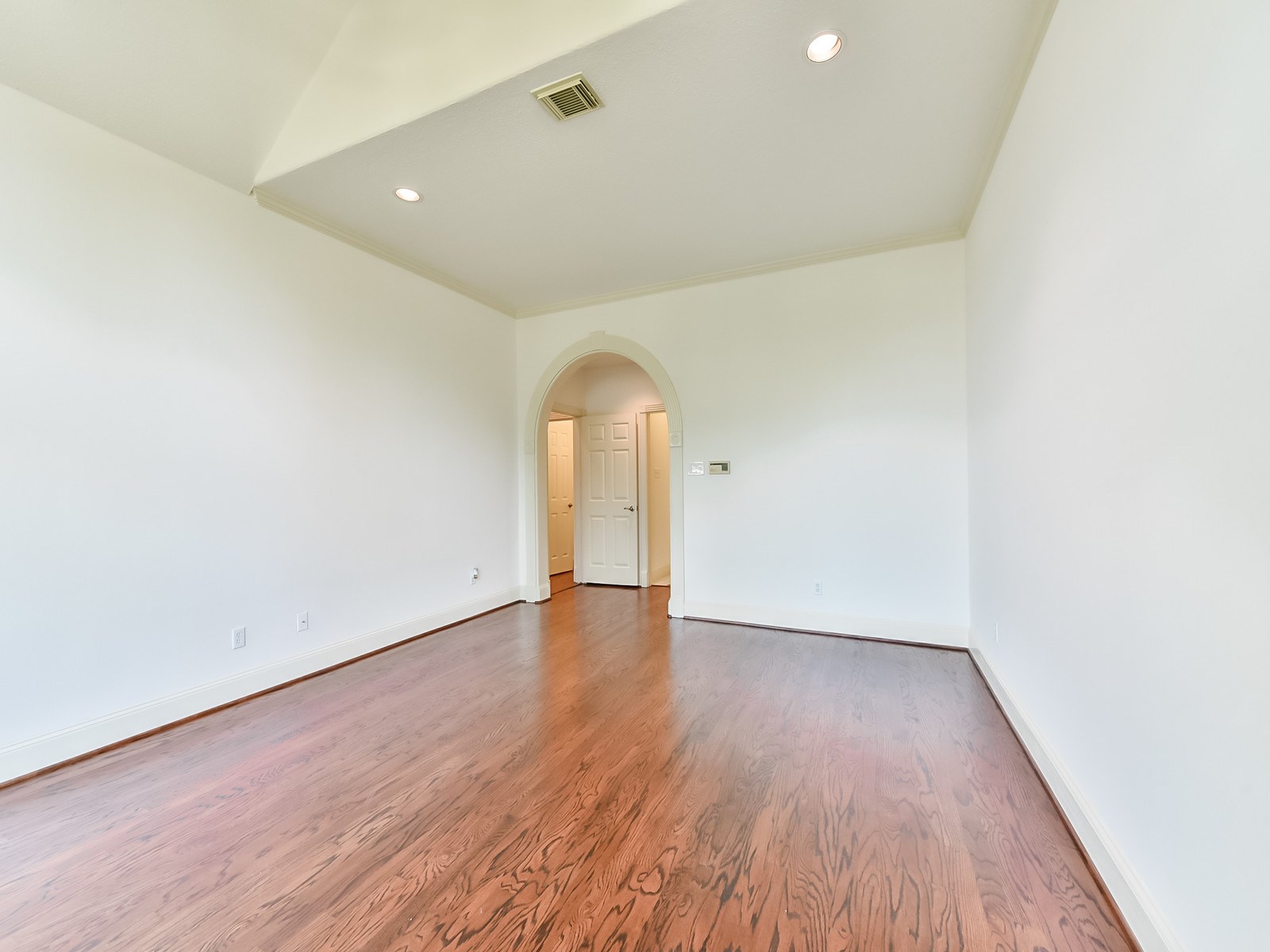 166 East Capstone Circle Spring, TX 77381 - Photo 25 of 45 an empty room with wooden floor and window