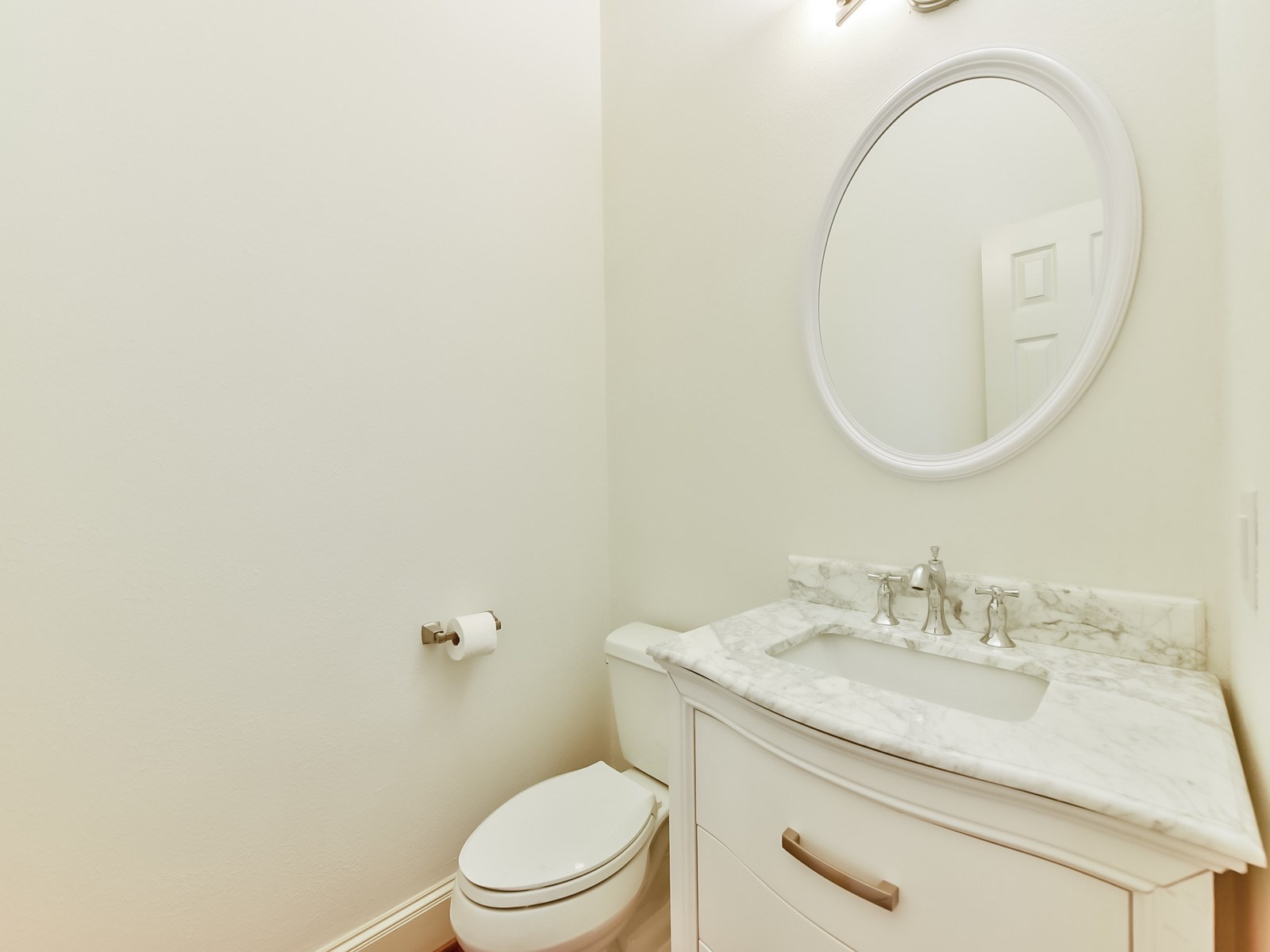 166 East Capstone Circle Spring, TX 77381 - Photo 30 of 45 a bathroom with a granite countertop toilet a sink and a mirror