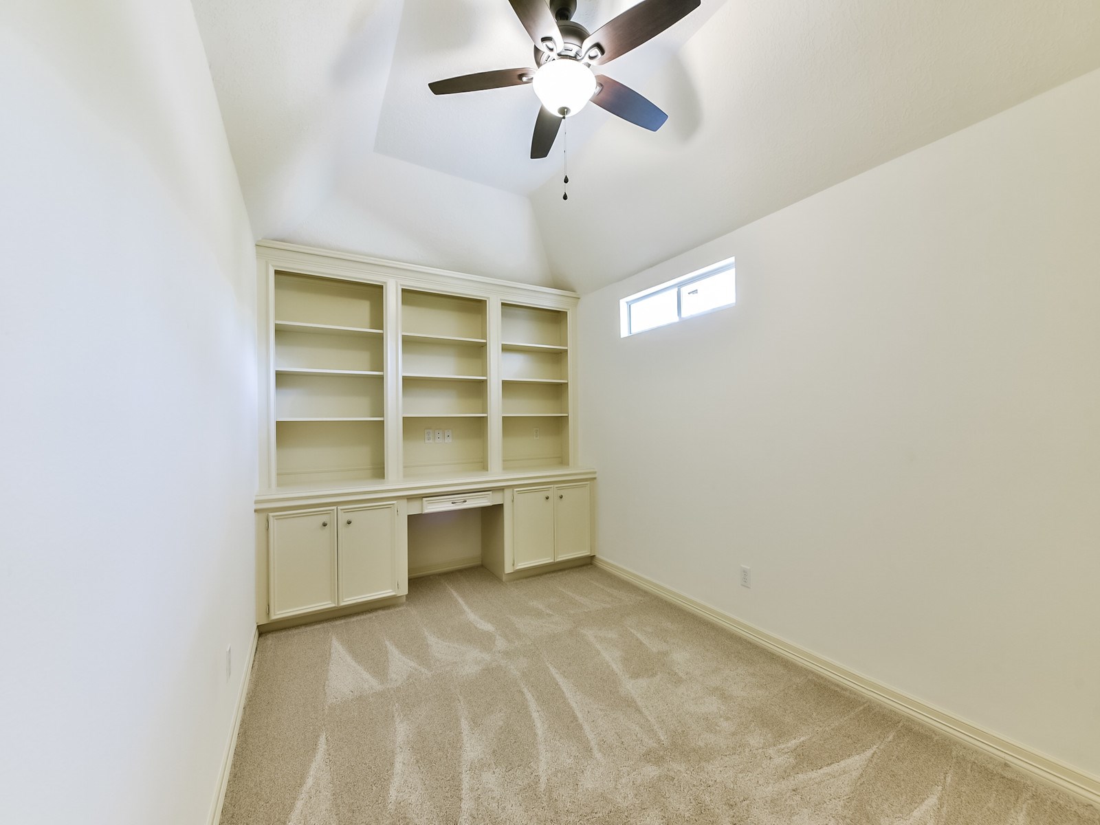 166 East Capstone Circle Spring, TX 77381 - Photo 34 of 45 a view of a cabinet and a chandelier fan in a room