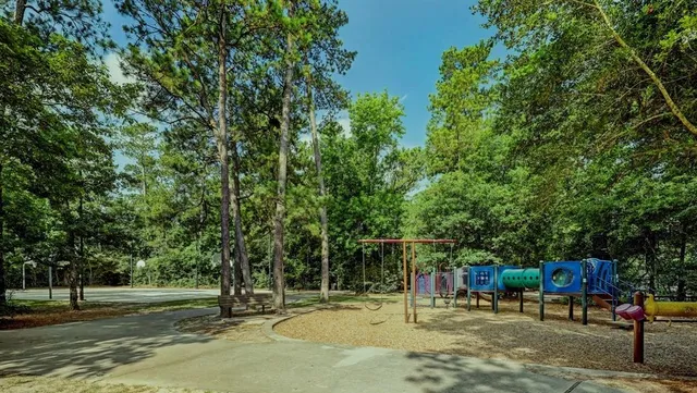 a view of a yard from a balcony