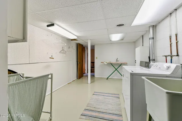 a room with a washer and dryer