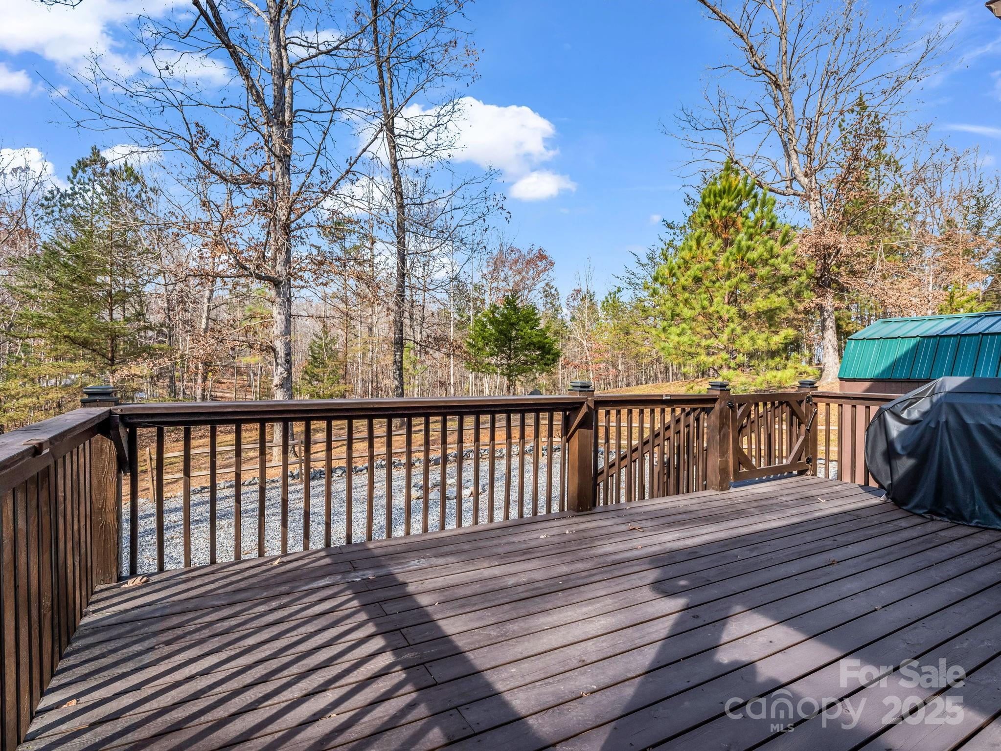 815 Cross Ridge Drive Rutherfordton, NC 28139 - Photo 12 of 34 a balcony with wooden floor and fence