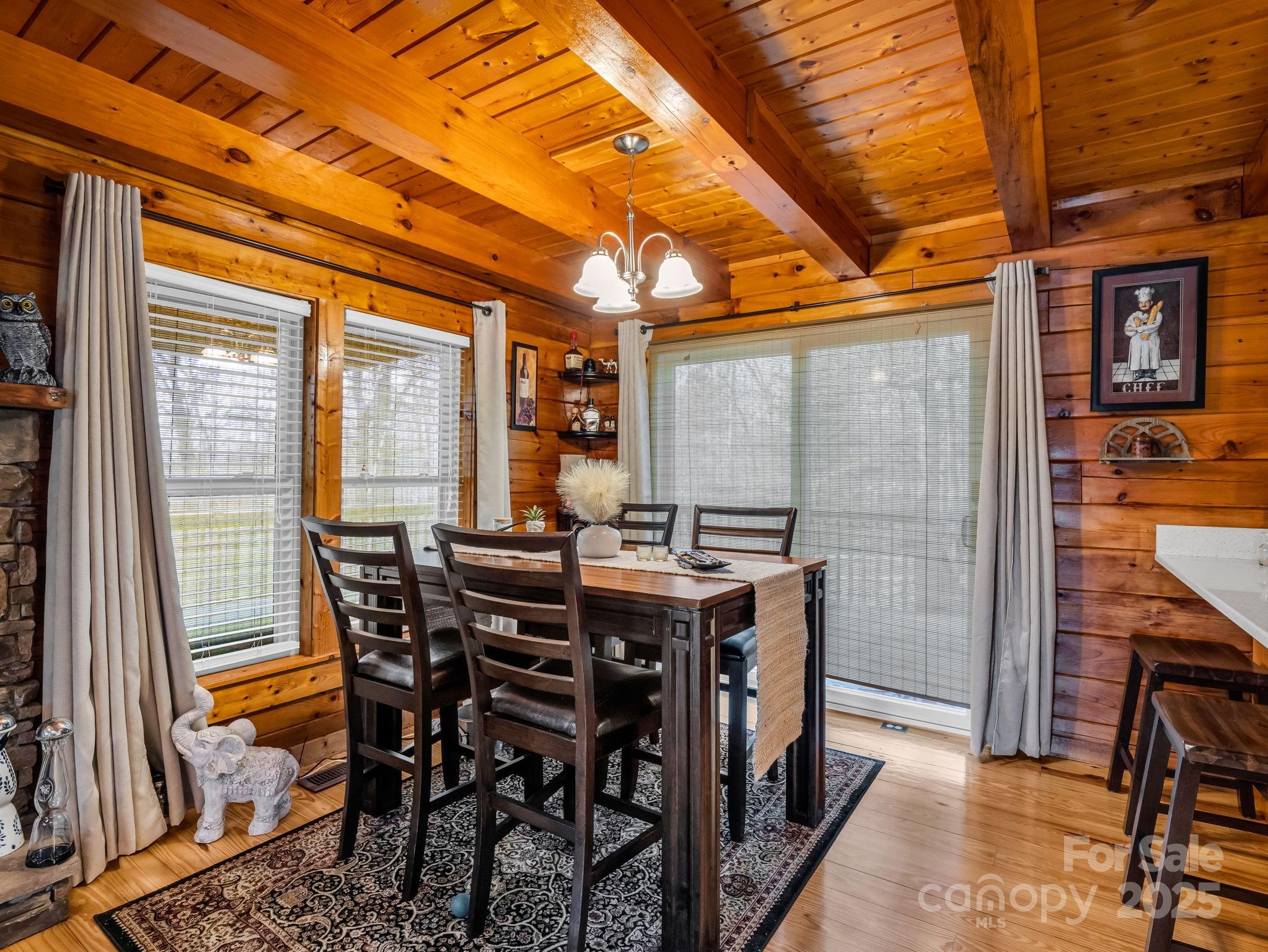 815 Cross Ridge Drive Rutherfordton, NC 28139 - Photo 19 of 34 a view of an outside dining space with a table and chairs