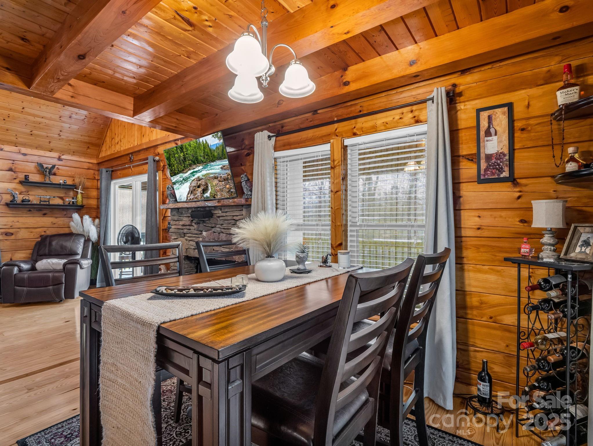 815 Cross Ridge Drive Rutherfordton, NC 28139 - Photo 20 of 34 a view of a dining room with furniture and chandelier
