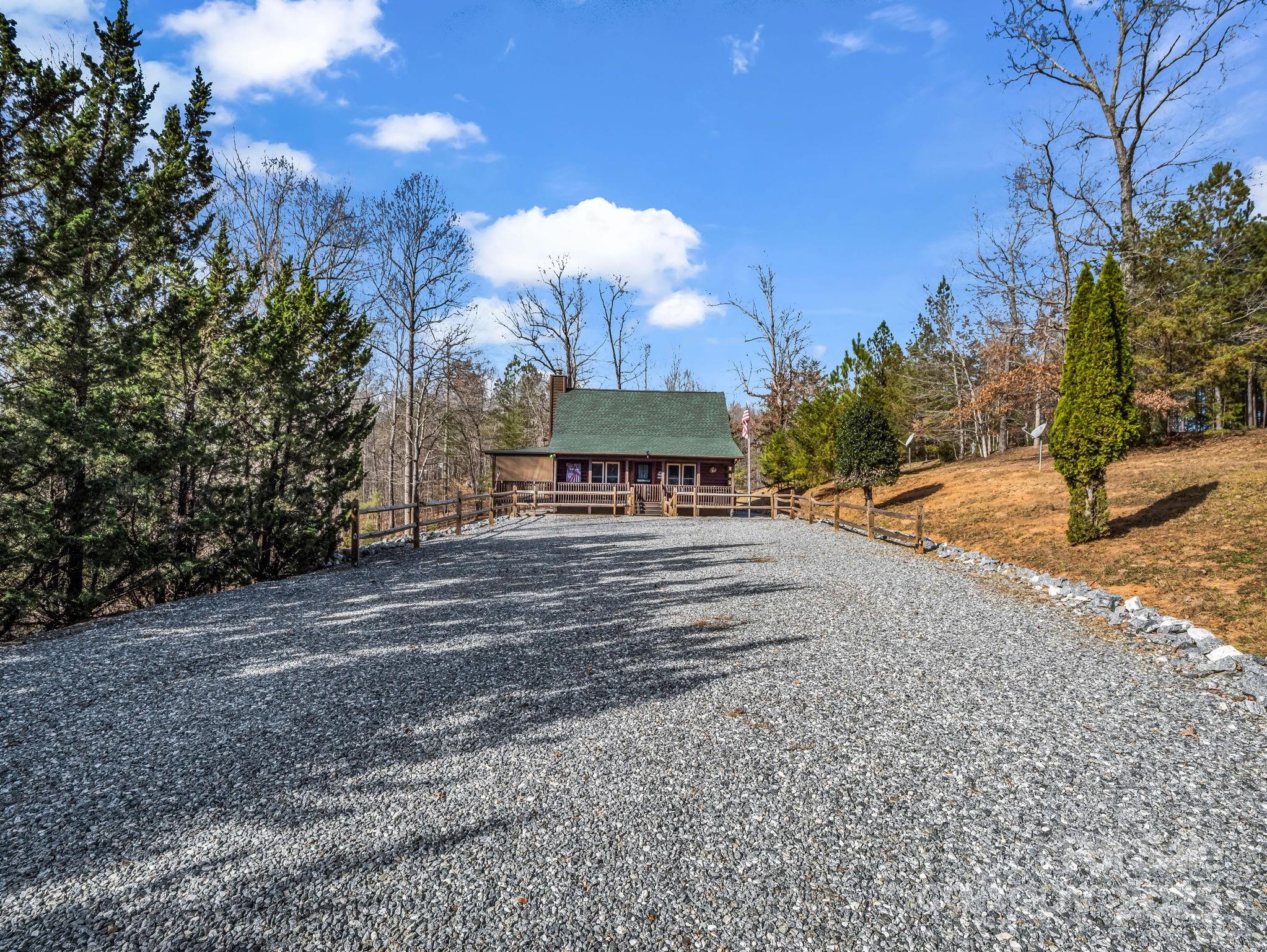 815 Cross Ridge Drive Rutherfordton, NC 28139 - Photo 3 of 34 a view of a yard in front of the house