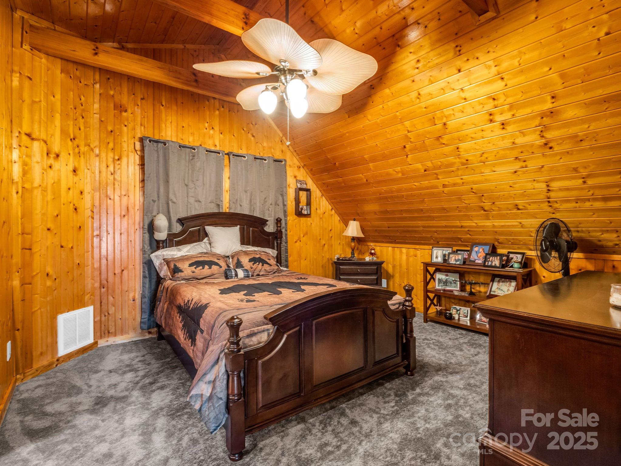 815 Cross Ridge Drive Rutherfordton, NC 28139 - Photo 31 of 34 a bedroom with a bed and a view of residential houses
