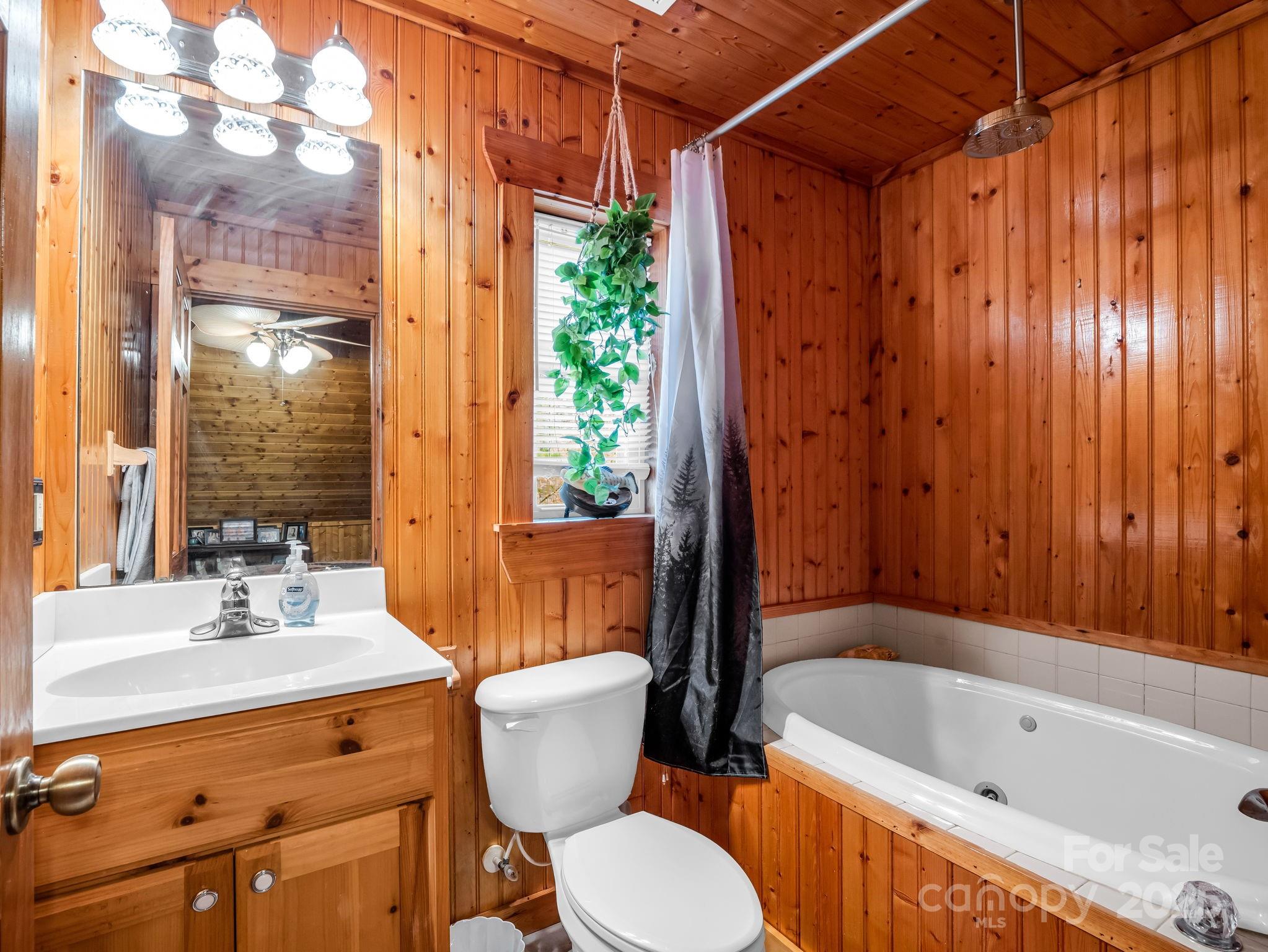 815 Cross Ridge Drive Rutherfordton, NC 28139 - Photo 34 of 34 a bathroom with a sink a toilet and shower