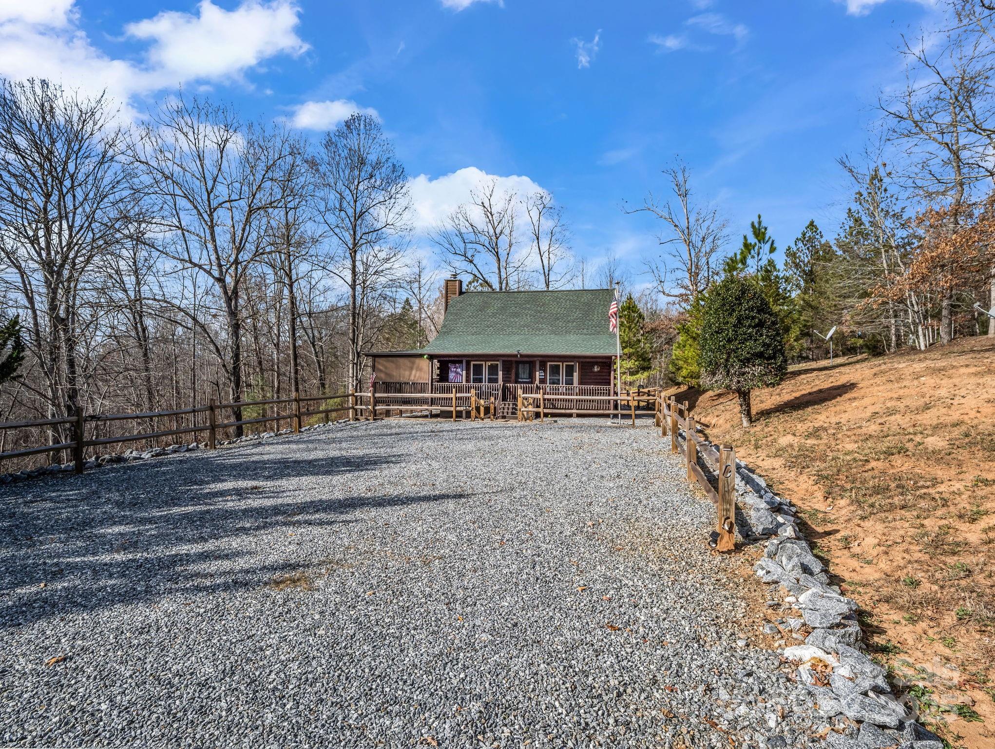815 Cross Ridge Drive Rutherfordton, NC 28139 - Photo 4 of 34 a view of a house with a yard