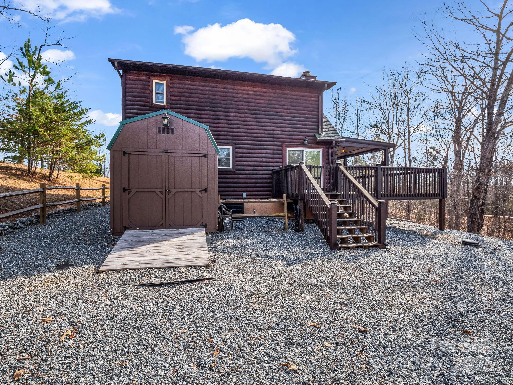815 Cross Ridge Drive Rutherfordton, NC 28139 - Photo 7 of 34 a front view of a house with garden