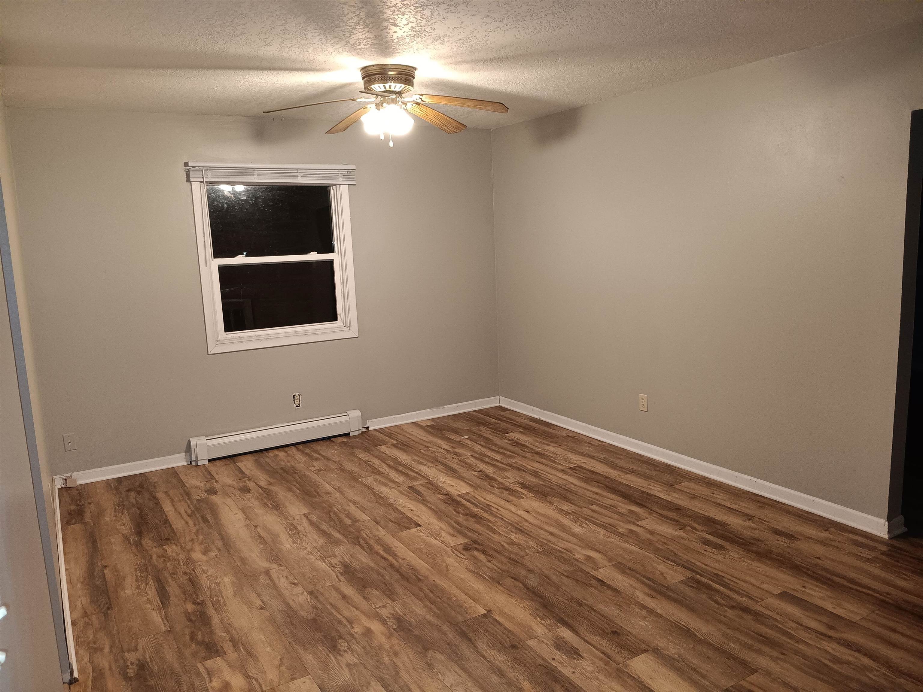 1604 Parkside Court Freeport, IL 61032 - Photo 4 of 11 a view of an empty room with a window
