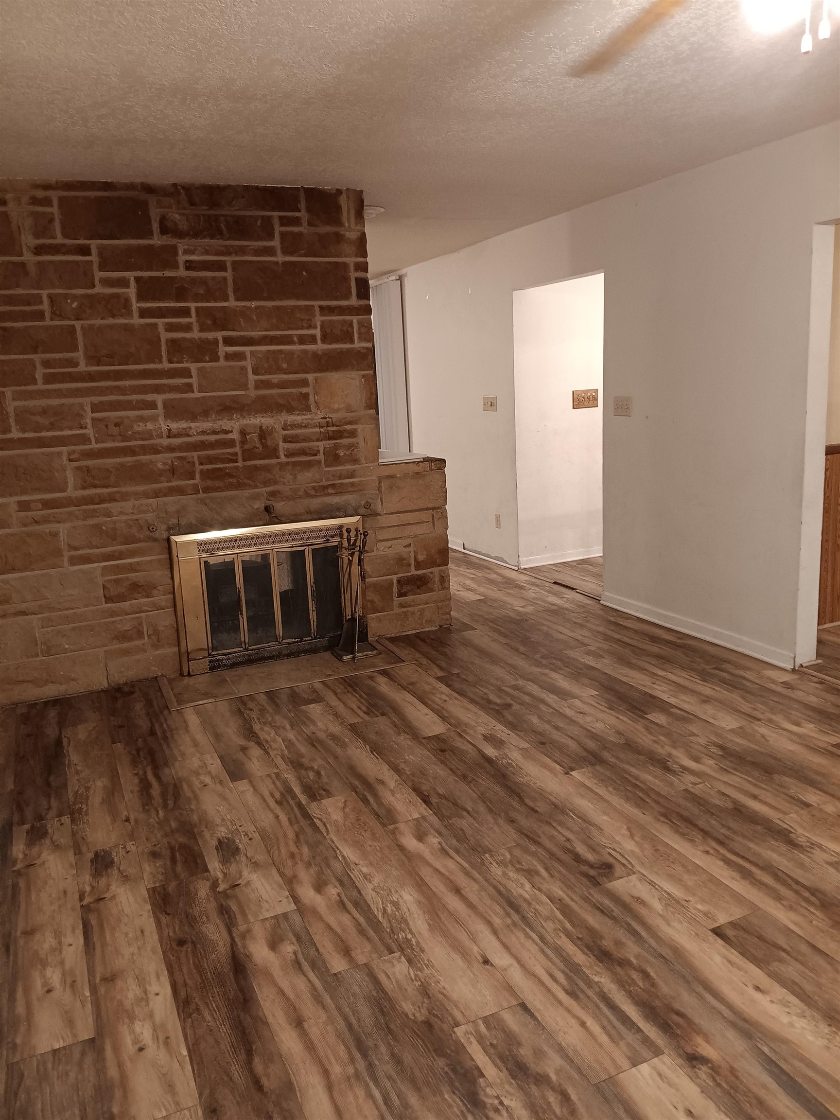 1604 Parkside Court Freeport, IL 61032 - Photo 5 of 11 a view of an empty room with wooden floor