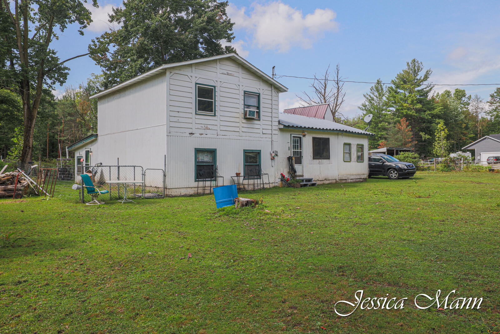 6093 Rollenhagen Road Ravenna, MI 49451 - Photo 1 of 28 Front