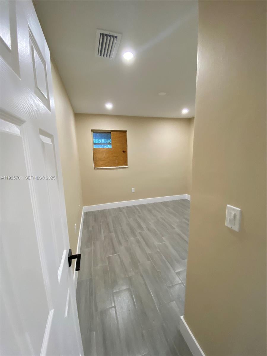 234 Northeast 55th Terrace Miami, FL 33137 - Photo 18 of 22 a view of a hallway