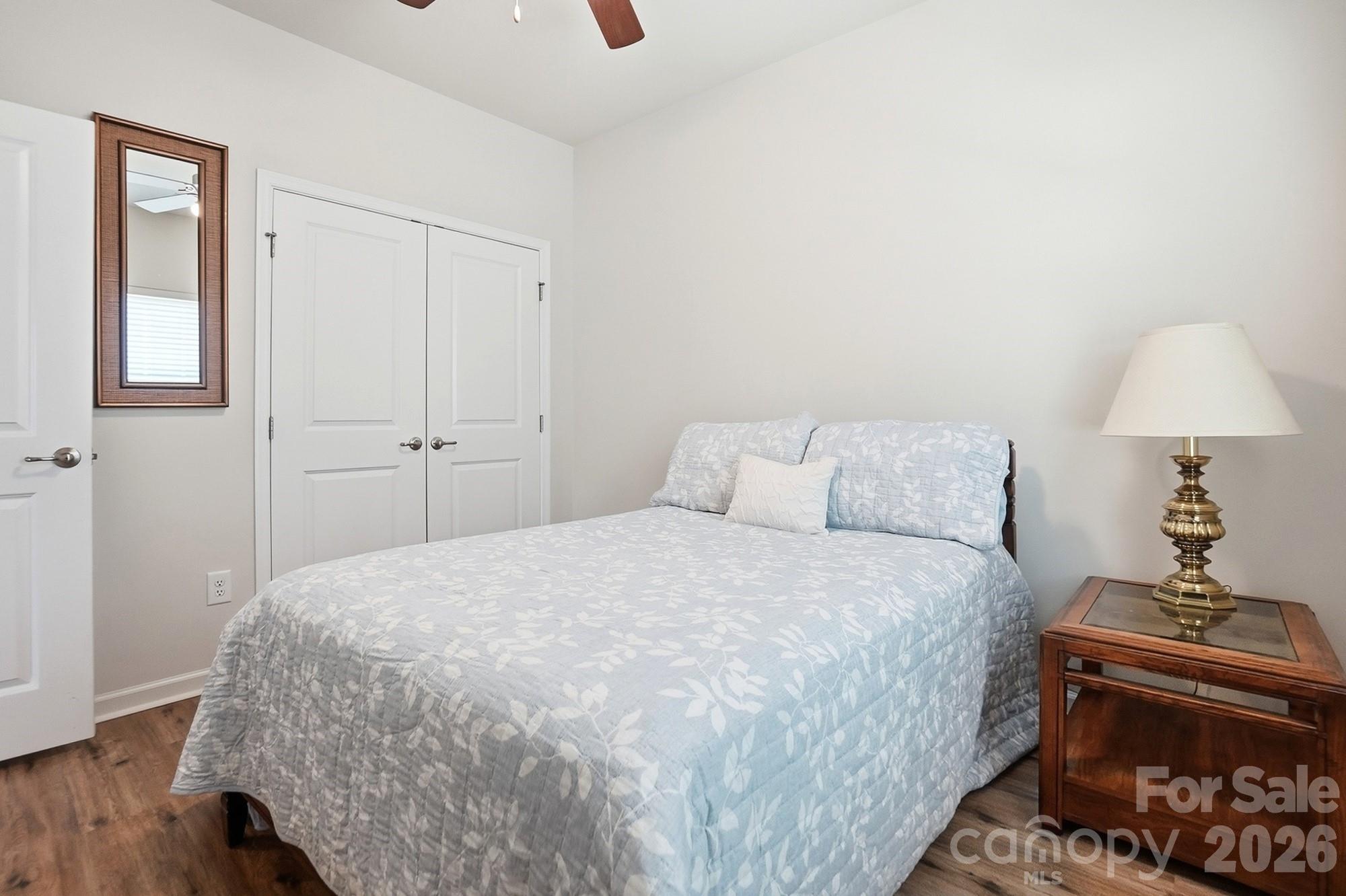 1842 Slippery Rock Lane Monroe, NC 28112 - Photo 16 of 25 a bedroom with a bed and a table