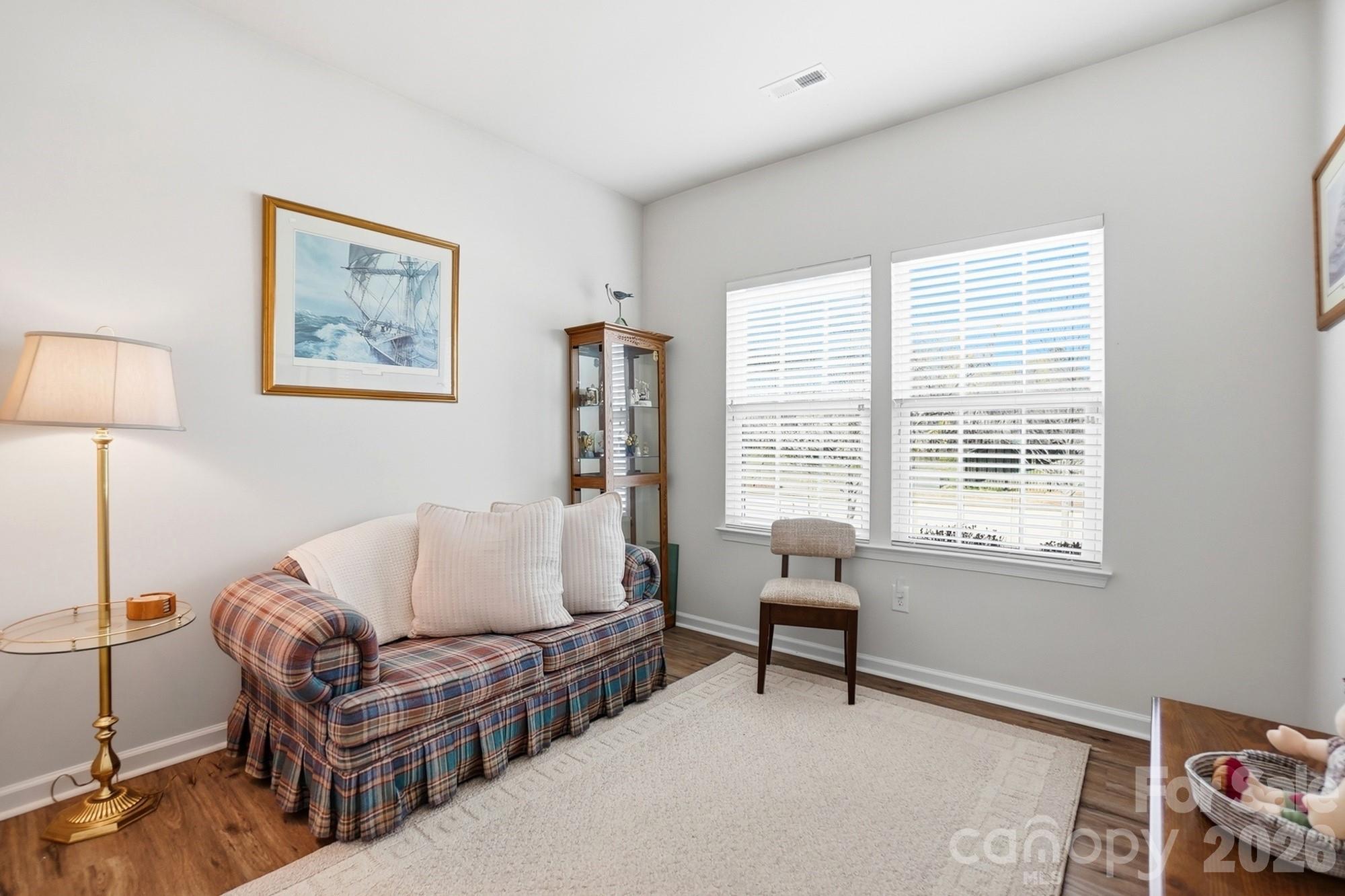 1842 Slippery Rock Lane Monroe, NC 28112 - Photo 19 of 25 a living room with furniture and a window