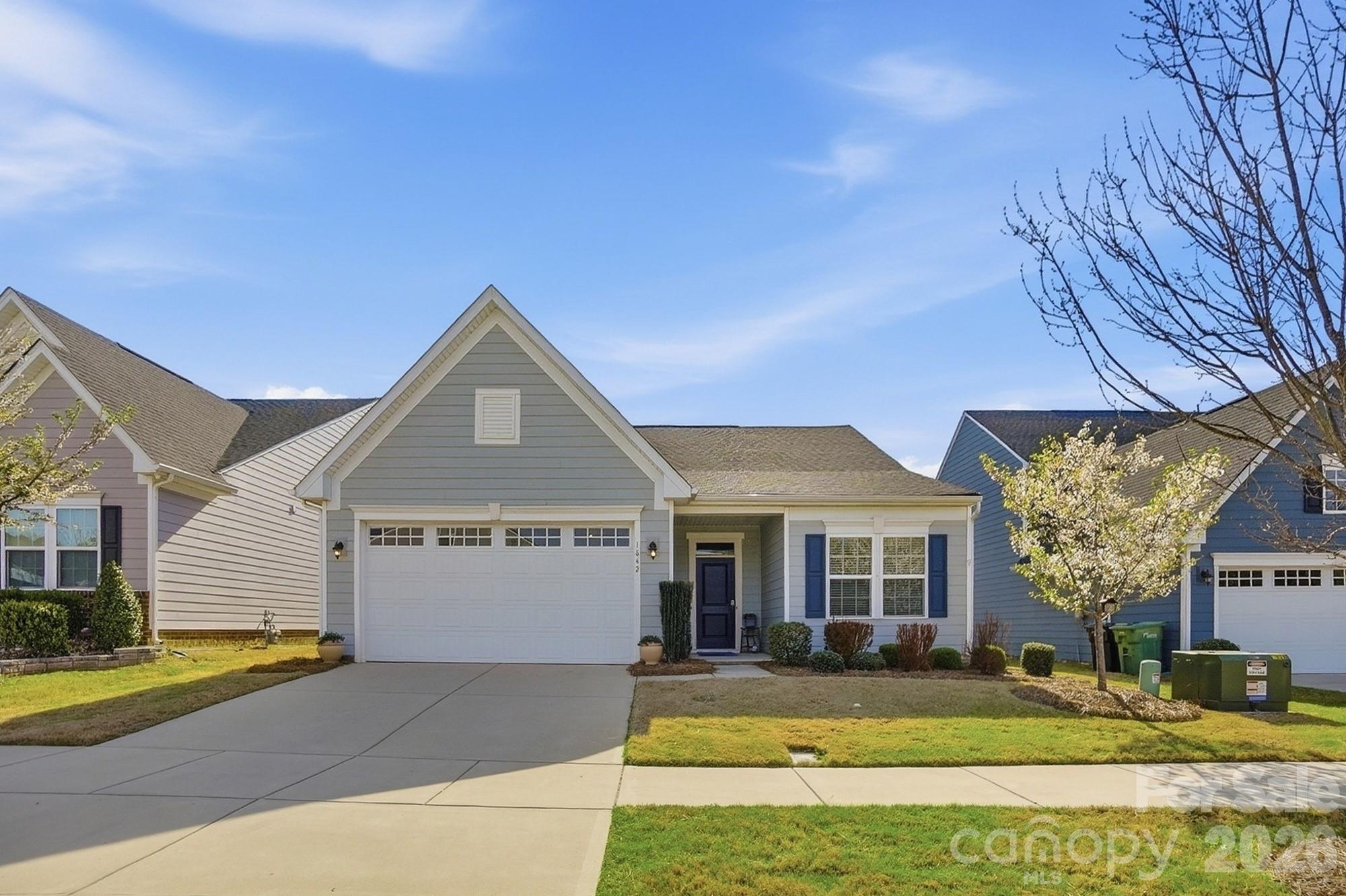 1842 Slippery Rock Lane Monroe, NC 28112 - Photo 2 of 25 a front view of a house with a yard