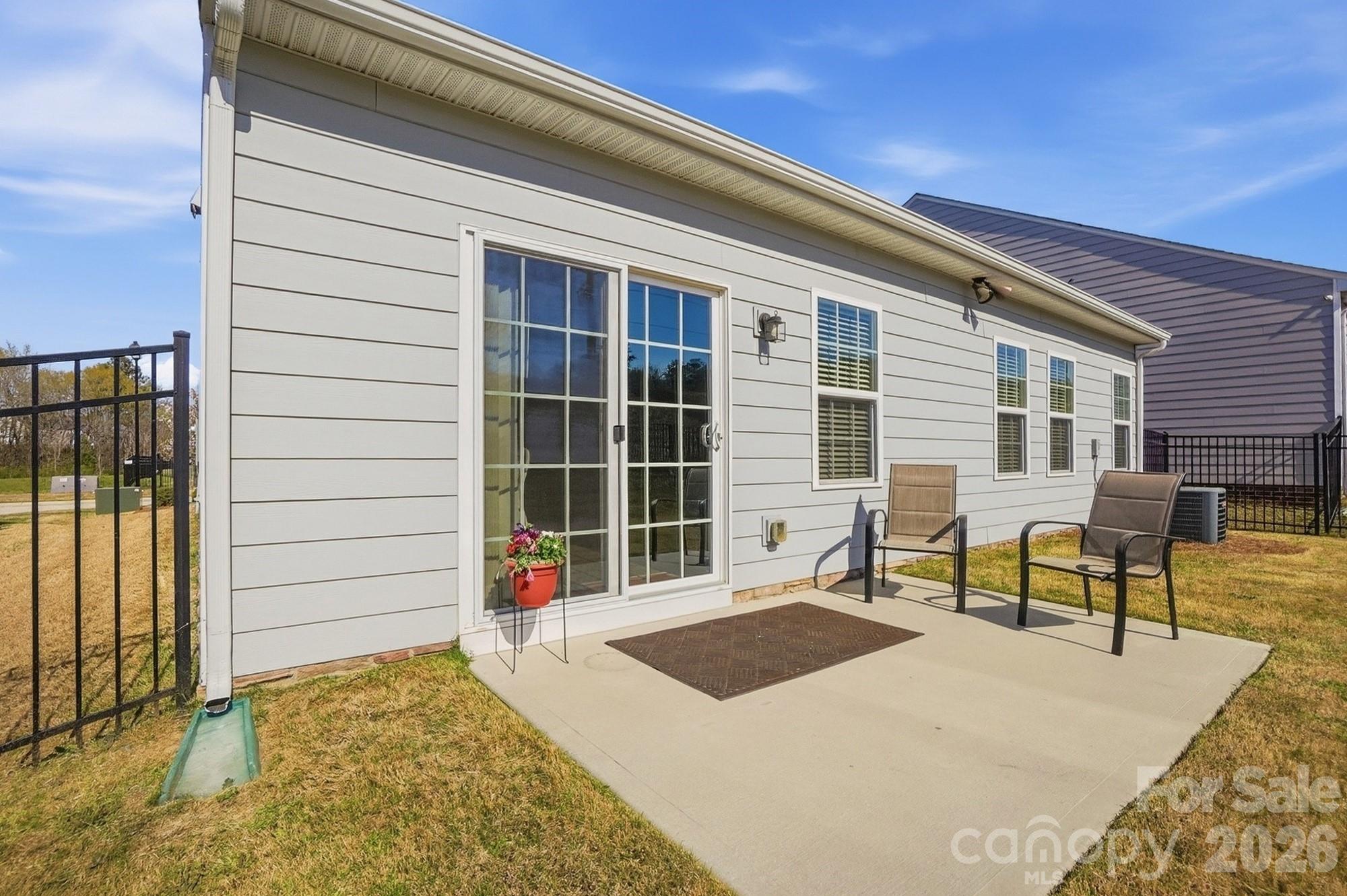 1842 Slippery Rock Lane Monroe, NC 28112 - Photo 22 of 25 a front view of a house with a outdoor seating