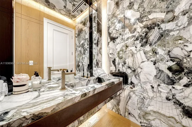 a terrace with outdoor seating and city view