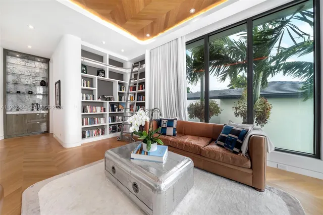 a view of a balcony with chairs