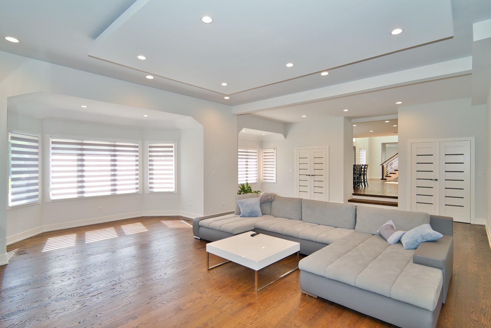 210 Cottonwood Road Northbrook, IL 60062 - Photo 13 of 47 a living room with furniture and a large window
