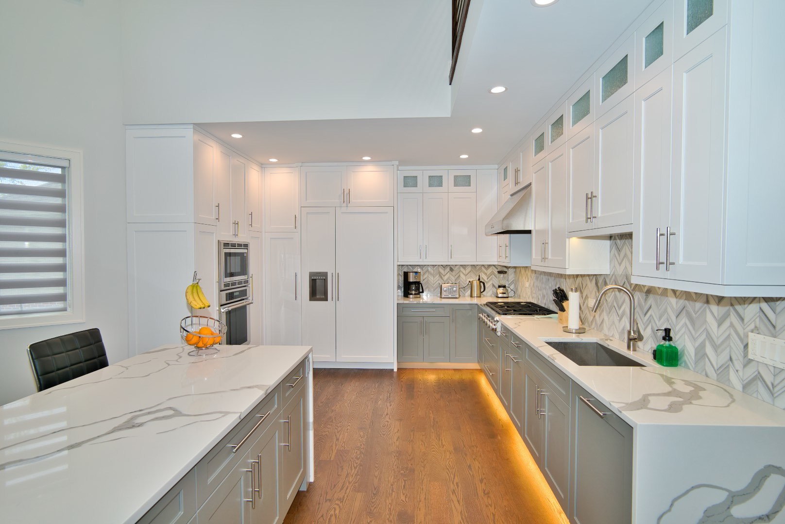 210 Cottonwood Road Northbrook, IL 60062 - Photo 23 of 47 a large kitchen with stainless steel appliances kitchen island granite countertop a sink and cabinets