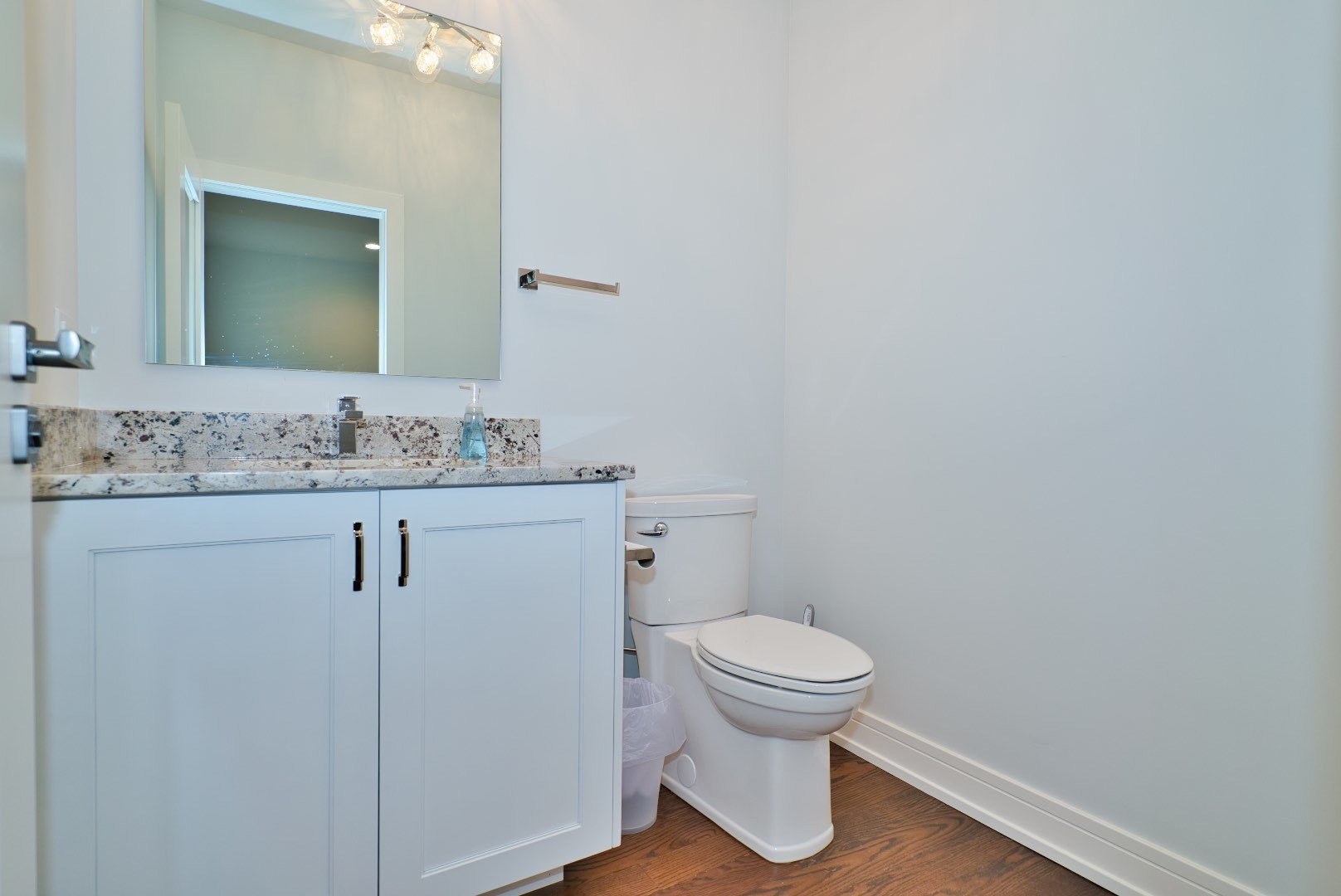 210 Cottonwood Road Northbrook, IL 60062 - Photo 27 of 47 a bathroom with a sink toilet and mirror