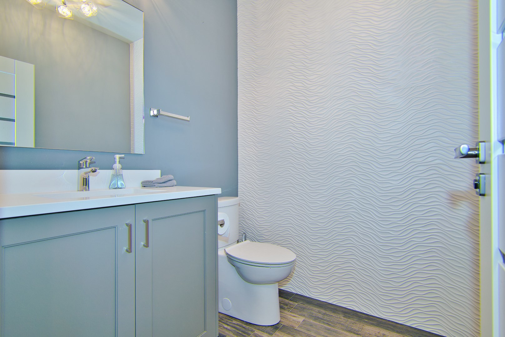 210 Cottonwood Road Northbrook, IL 60062 - Photo 30 of 47 a bathroom with a toilet sink and mirror