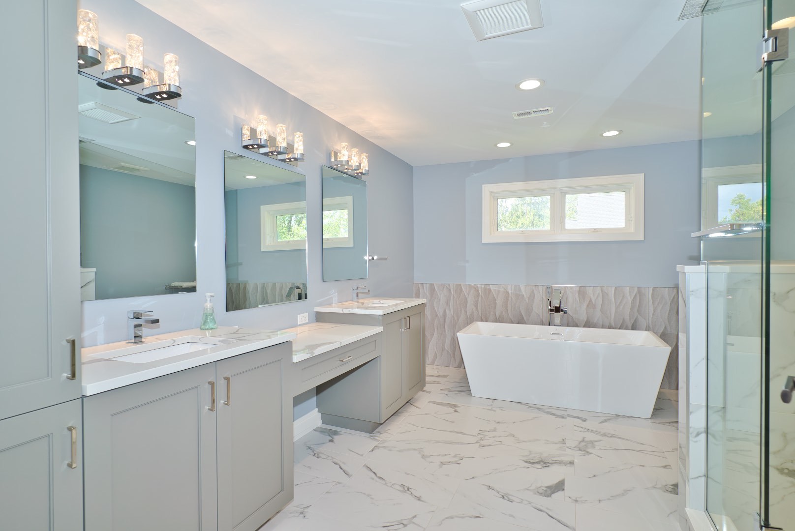 210 Cottonwood Road Northbrook, IL 60062 - Photo 32 of 47 a spacious bathroom with a double vanity sink mirror and bathtub