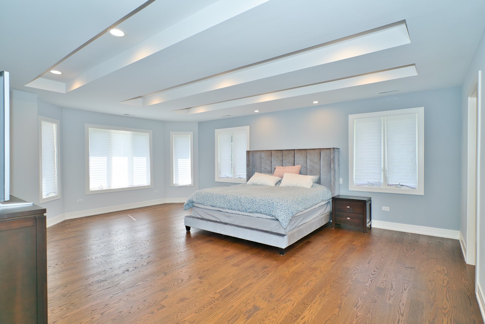 210 Cottonwood Road Northbrook, IL 60062 - Photo 34 of 47 a bedroom with a bed and wooden floor