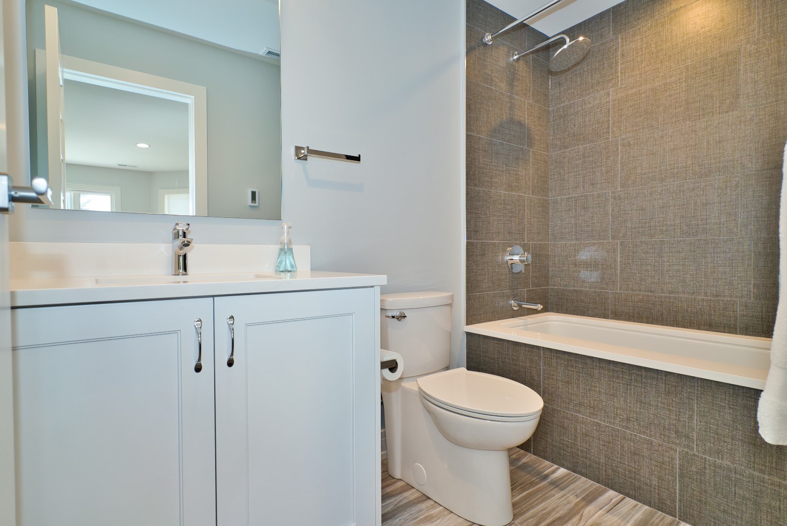 210 Cottonwood Road Northbrook, IL 60062 - Photo 35 of 47 a bathroom with a sink a toilet and shower