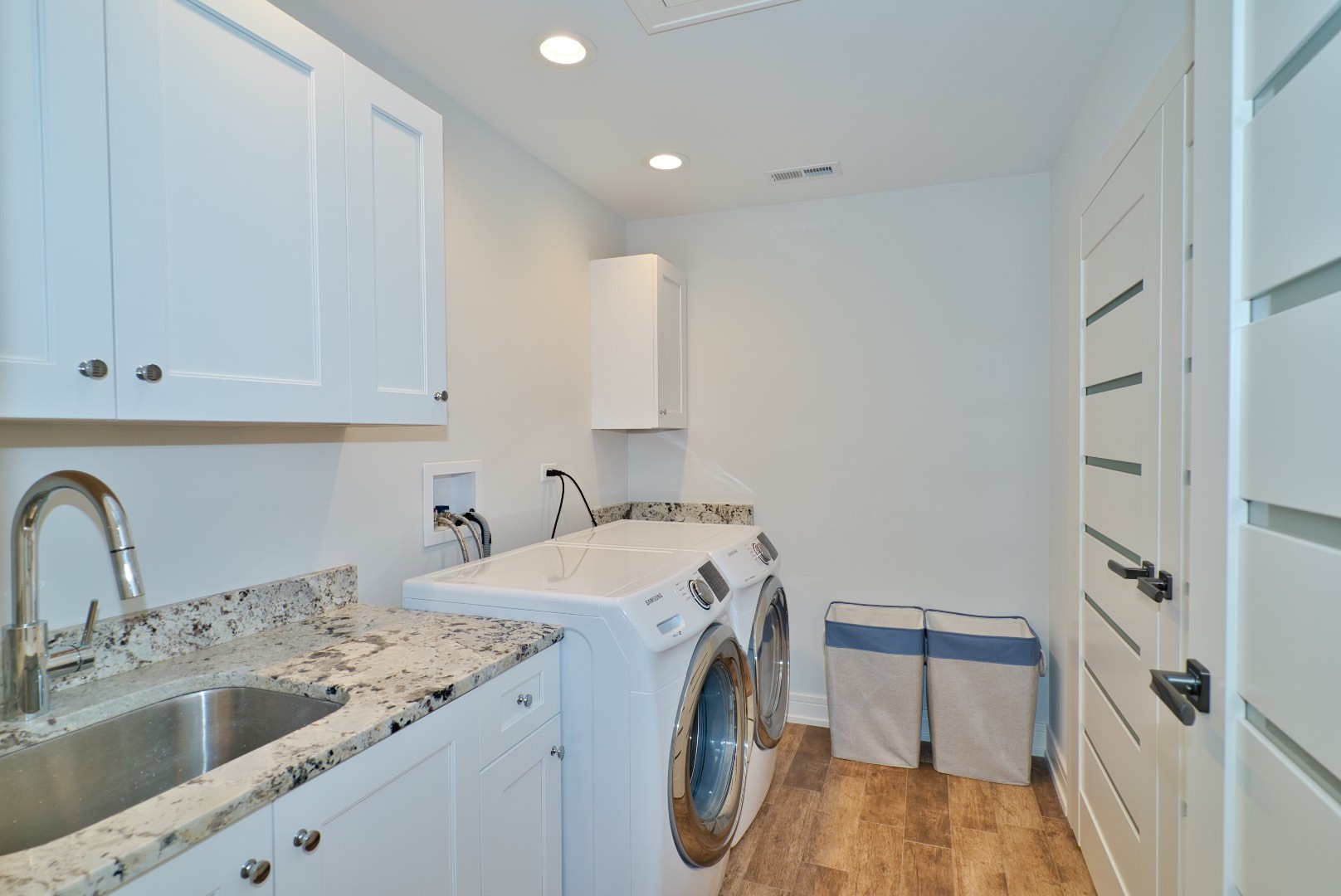 210 Cottonwood Road Northbrook, IL 60062 - Photo 37 of 47 a view of a kitchen with sink and washing machine