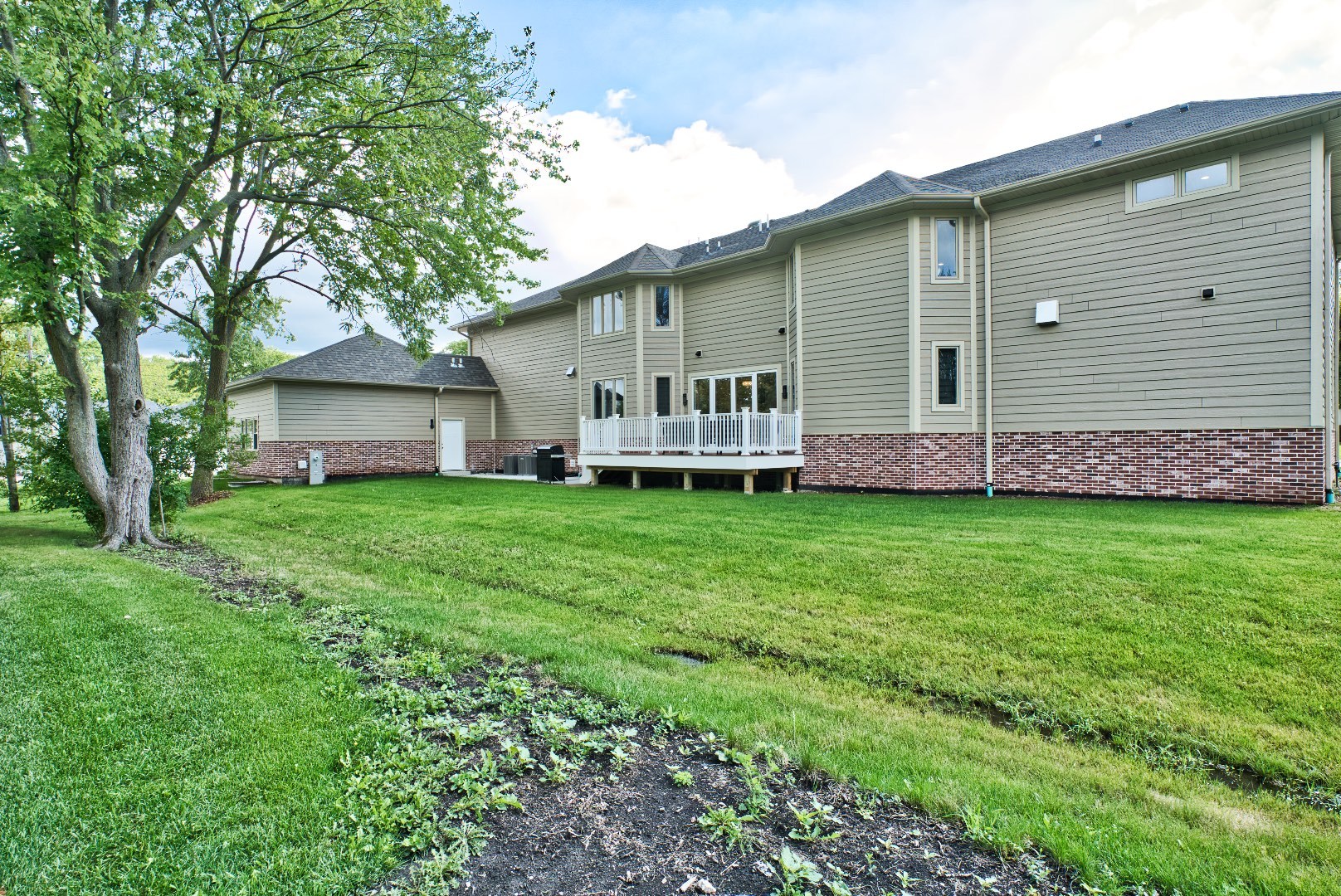 210 Cottonwood Road Northbrook, IL 60062 - Photo 42 of 47 a front view of house with yard and green space