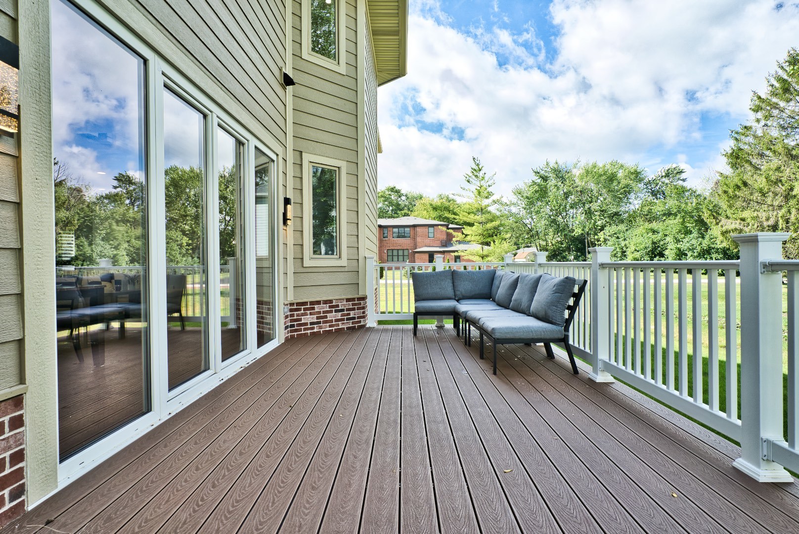 210 Cottonwood Road Northbrook, IL 60062 - Photo 44 of 47 a balcony with wooden floor table and chairs