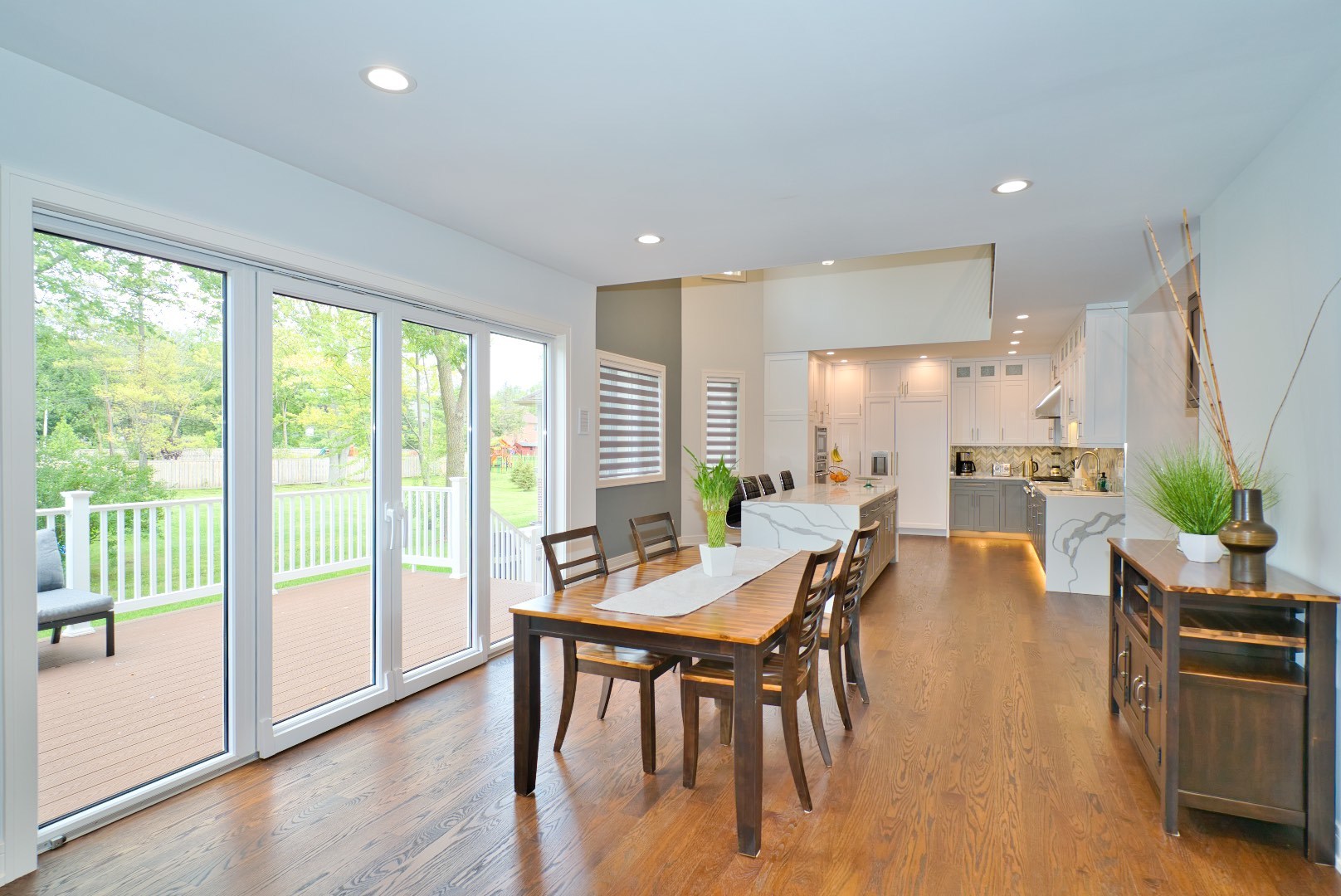 210 Cottonwood Road Northbrook, IL 60062 - Photo 8 of 47 a view of a dining room with furniture window and wooden floor