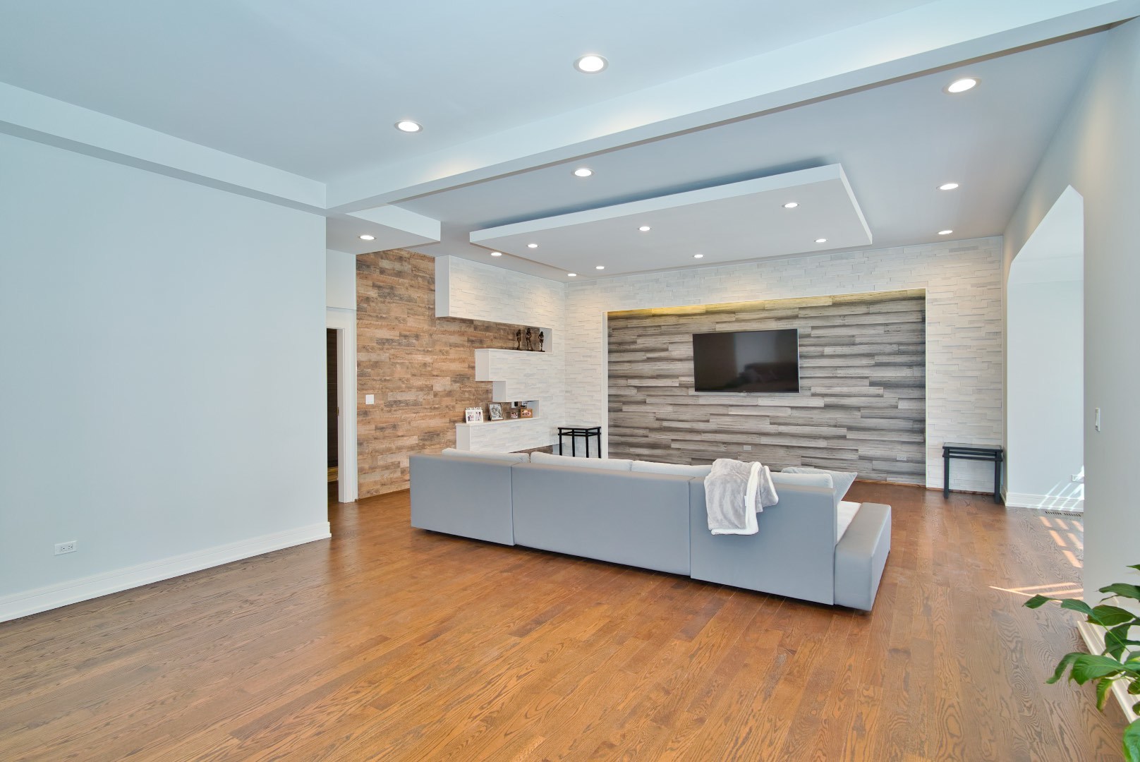 210 Cottonwood Road Northbrook, IL 60062 - Photo 10 of 47 a living room with furniture and a flat screen tv