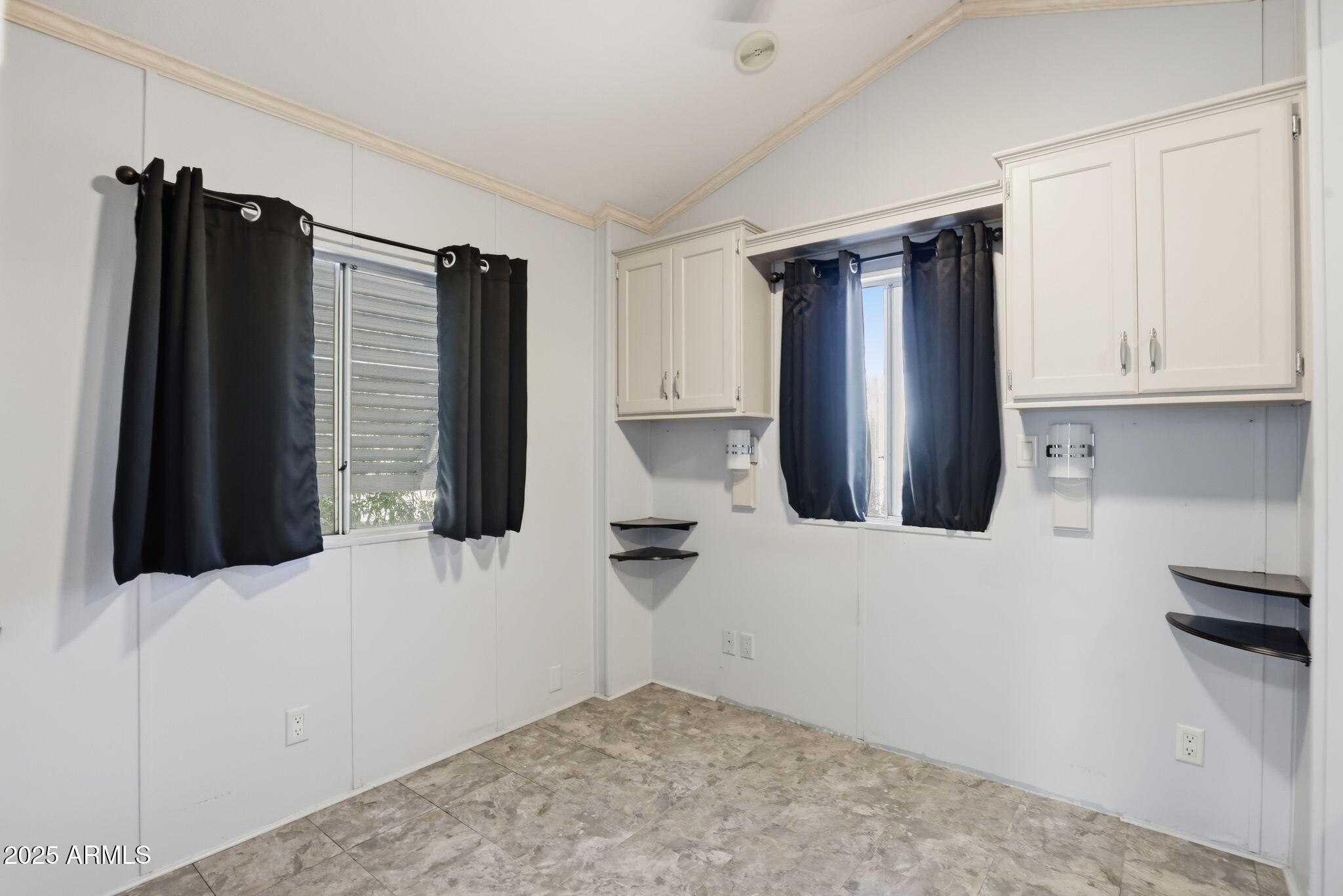 11201 North El Mirage Road, Unit 720 El Mirage, AZ 85335 - Photo 26 of 43 a kitchen with a refrigerator and window