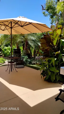 a kitchen with cabinets appliances a sink and a window
