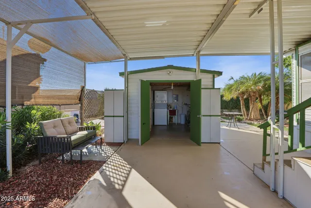 a kitchen with stainless steel appliances granite countertop a stove and cabinets
