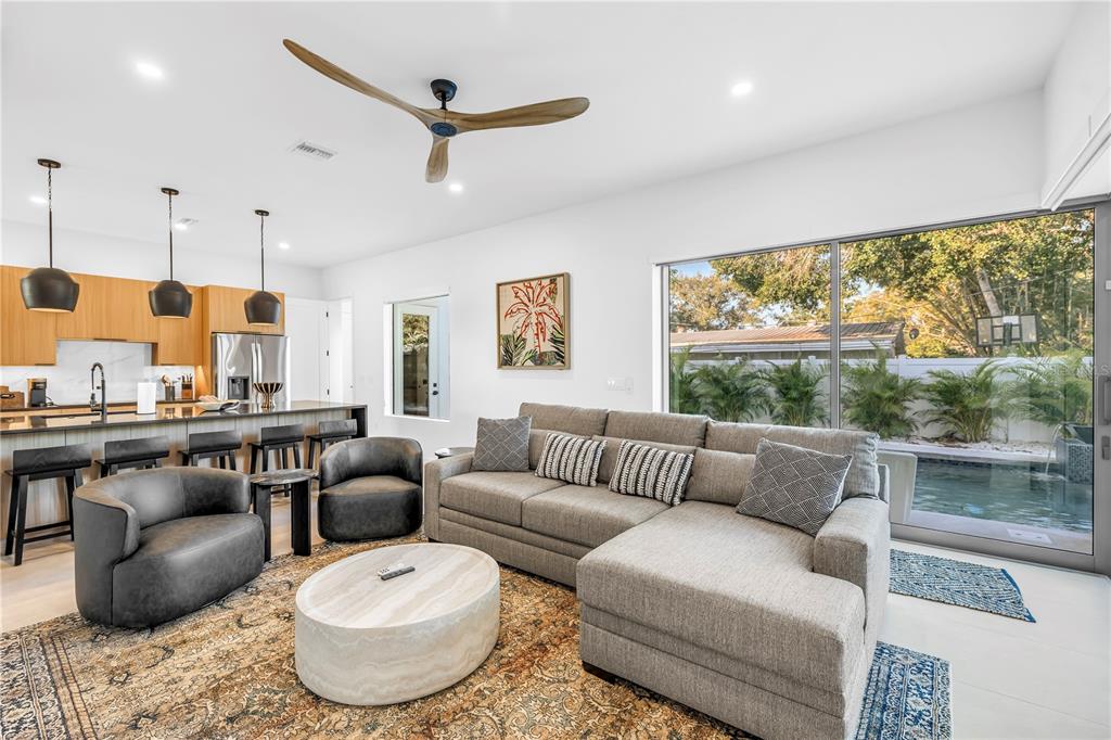 2305 Temple Street Sarasota, FL 34239 - Photo 18 of 64 a living room with furniture and a large window