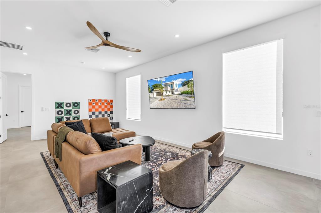 2305 Temple Street Sarasota, FL 34239 - Photo 36 of 64 a living room with furniture and a window