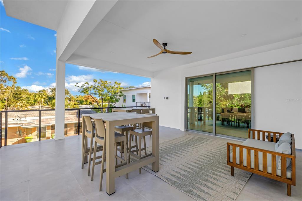 2305 Temple Street Sarasota, FL 34239 - Photo 53 of 64 a view of a dining room with furniture window and outside view