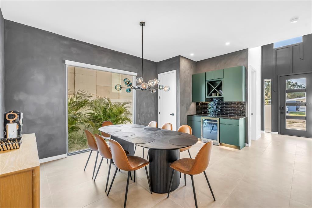 2305 Temple Street Sarasota, FL 34239 - Photo 9 of 64 a dining room with furniture and window