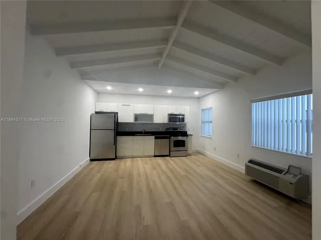 a view of a livingroom with furniture